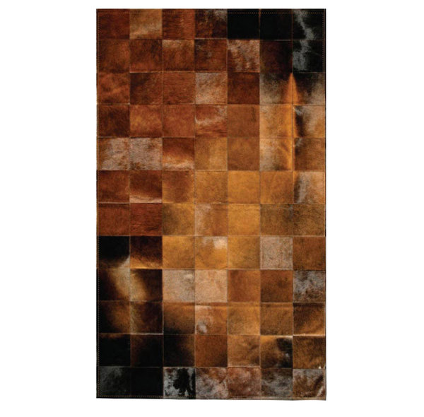 Madre tierra: Patchwork carpet from brown cowhide