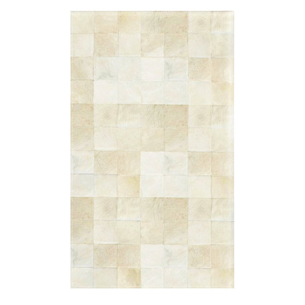 Ivory: Patchwork carpet from creamy white cowhide