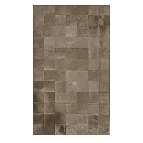 Platin: Patchwork-Teppich aus grauem Kuhfell