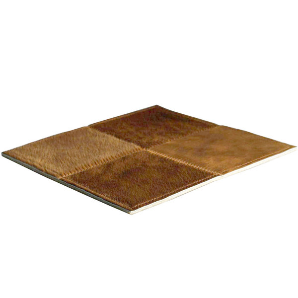 Mandel: Patchwork-Teppich aus hellbraunem Kuhfell
