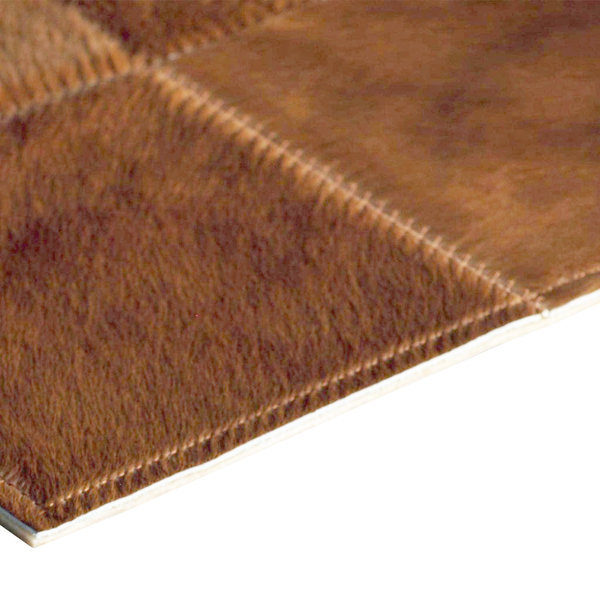 Mandel: Patchwork-Teppich aus hellbraunem Kuhfell