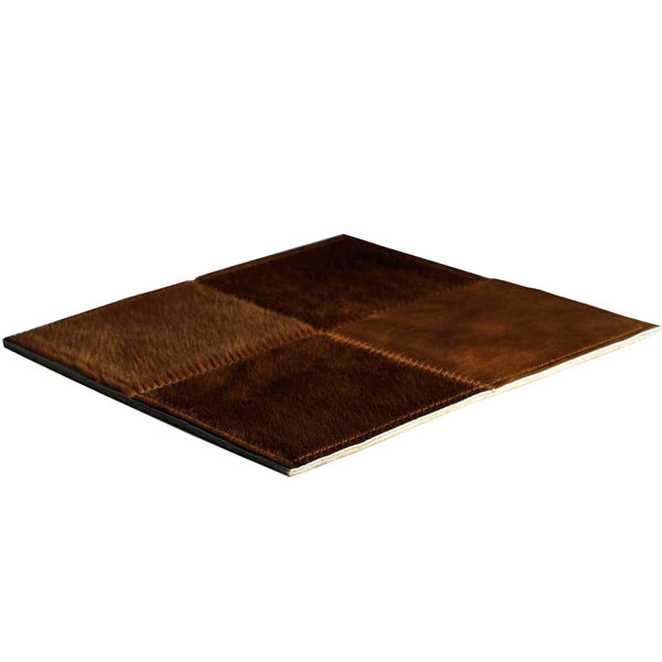 Tobacco: Patchwork carpet from brown cowhide