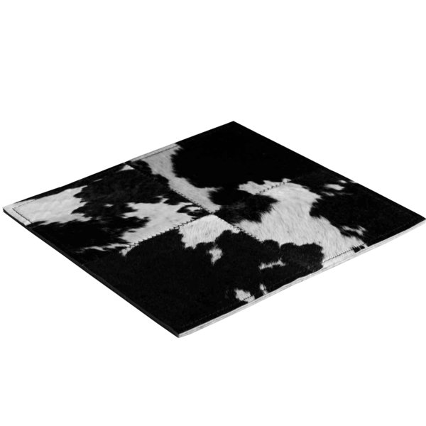 Salz und Pfeffer: Patchwork-Teppich aus schwarz-weissem Kuhfell